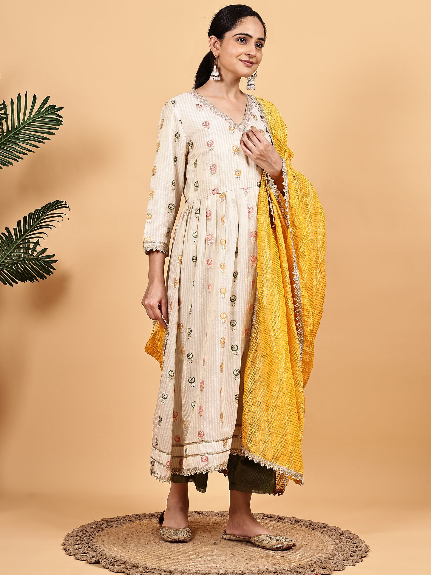 Cream Anarkali-style kurta set with Contrast Mustard Dupatta