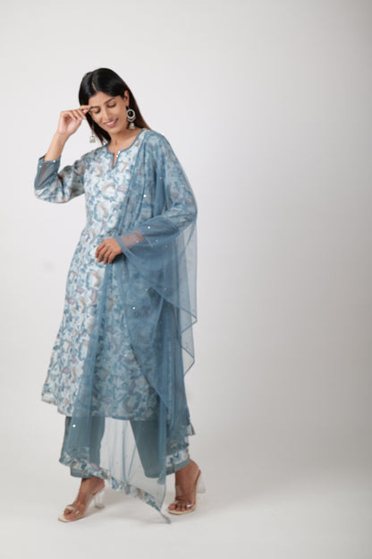 Straight Printed Powder Blue Kurta along with Pants and Embroidered chiffon Dupatta