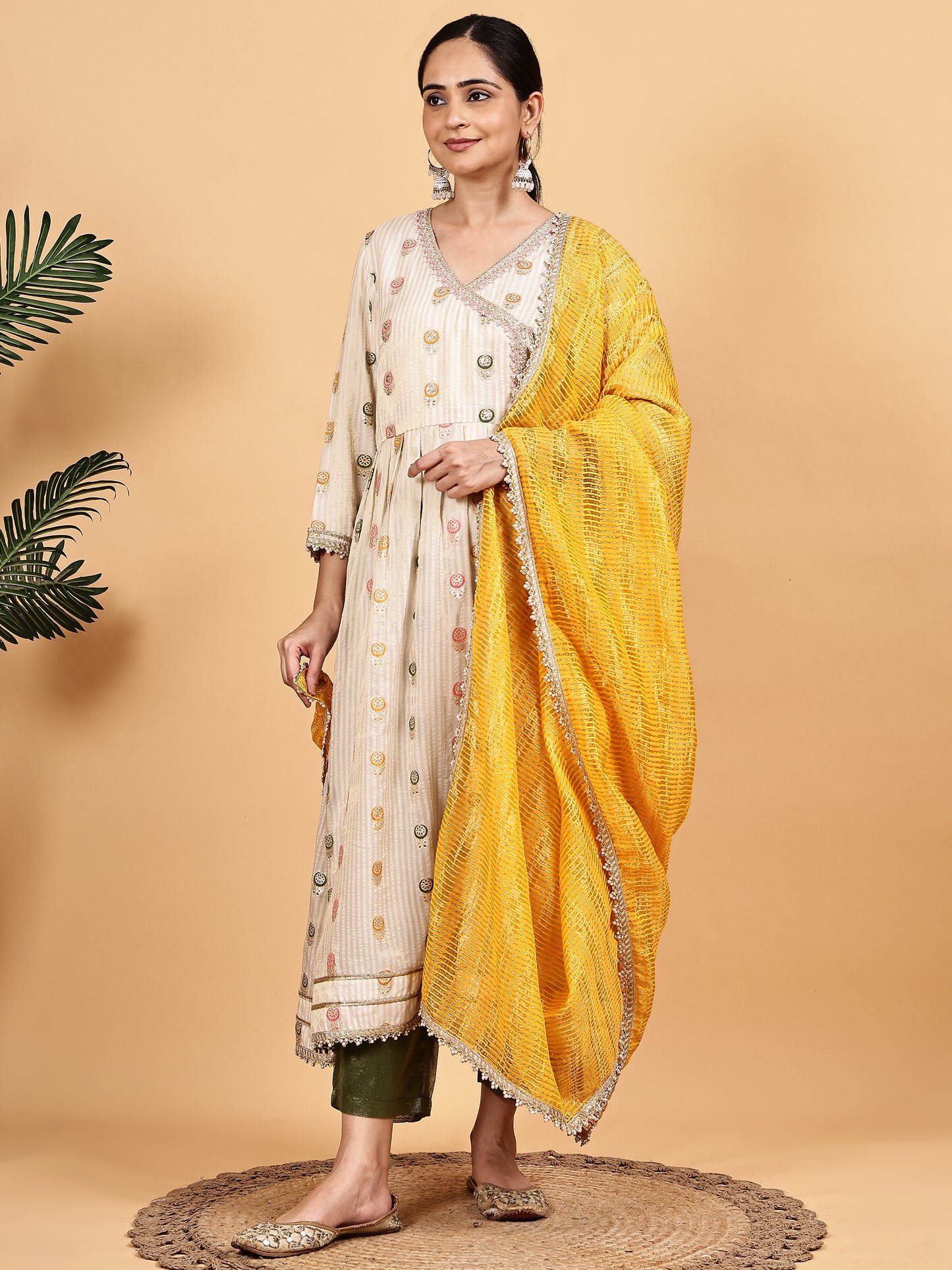 Cream Anarkali-style kurta set with Contrast Mustard Dupatta