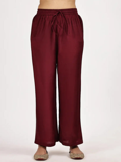 Maroon pants on a white background