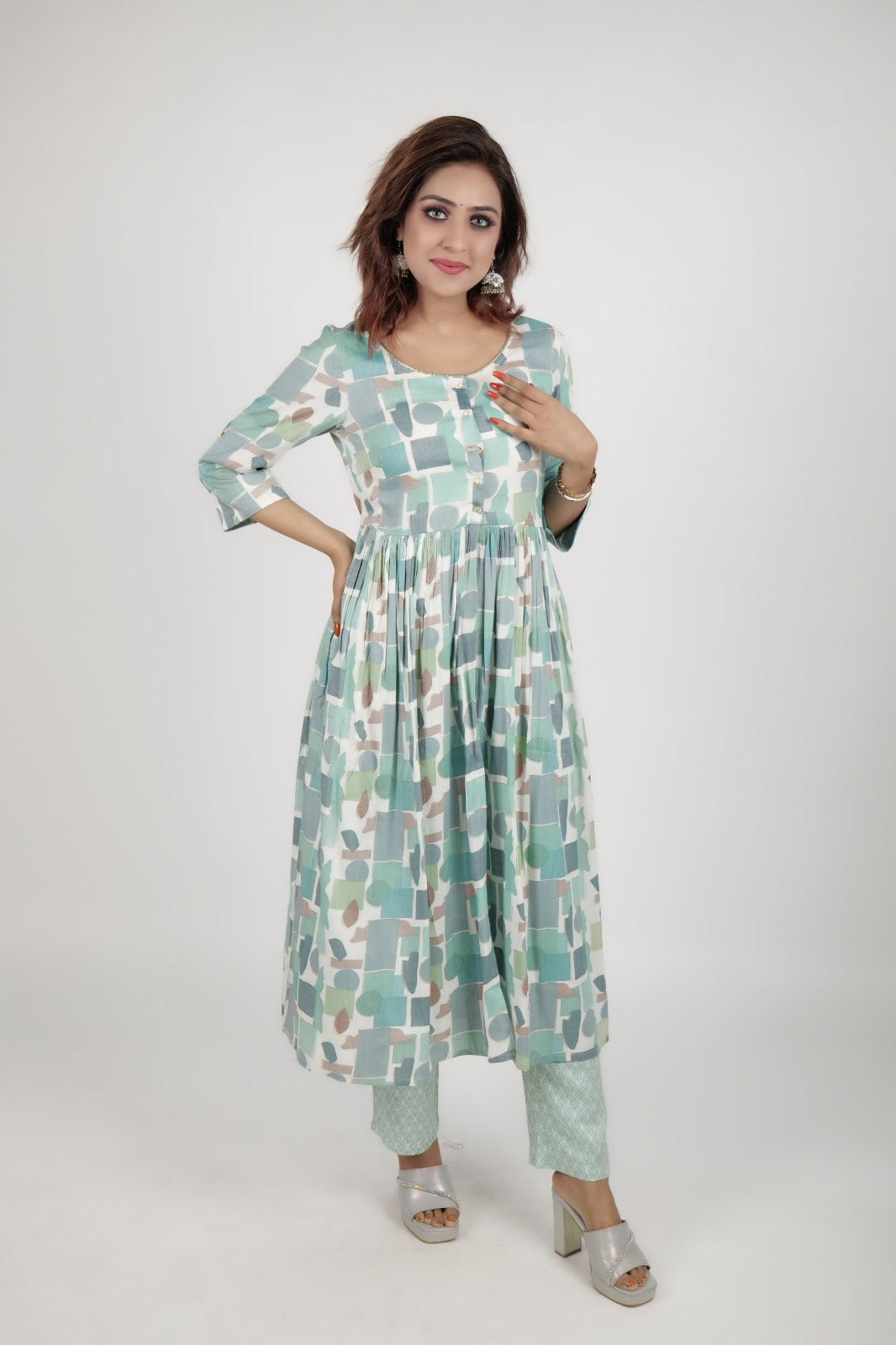 Green flower printed dress along with printed pants